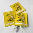 Żółta błyszcząca spersonalizowana kosmetyczka / foliowa płaska saszetka do pielęgnacji skóry o smaku zielonej herbaty
