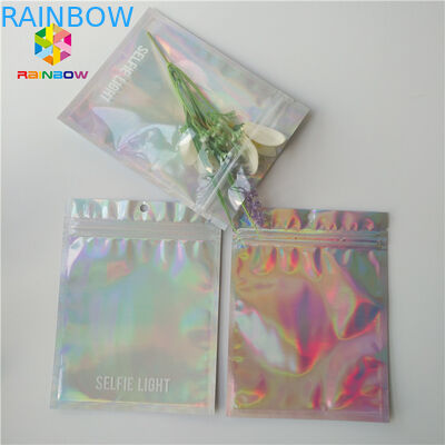 Jasno laserowa kosmetyczka w przezroczystym przednim / tylnym holograficznym opakowaniu