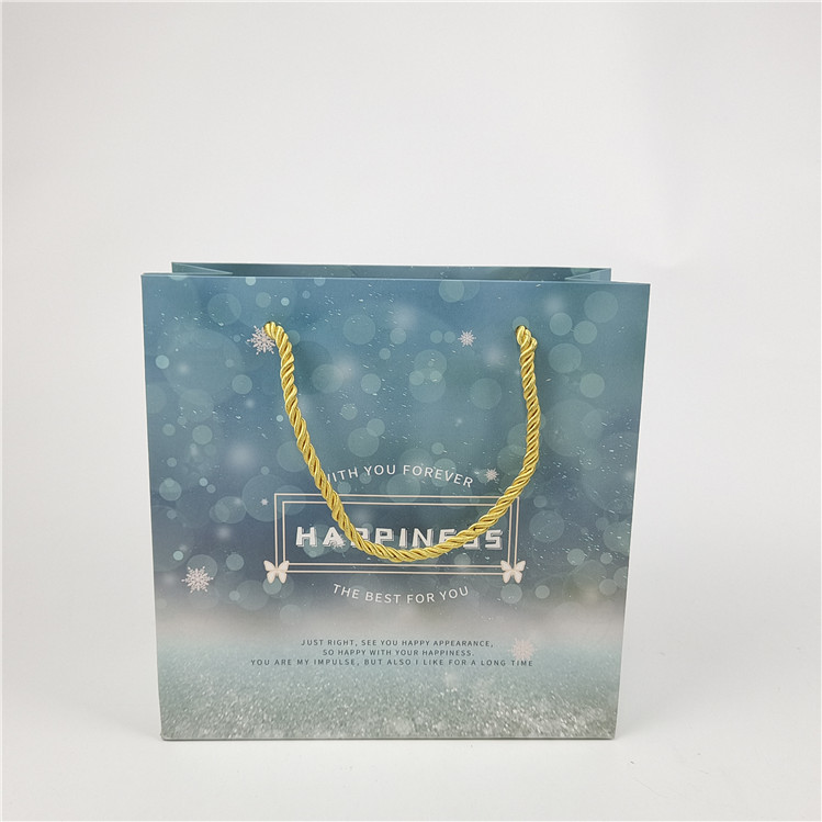 Najlepiej sprzedający się logo przyjazne dla środowiska drukowane torebka papierowa opakowanie biały 110 gram wielokrotne