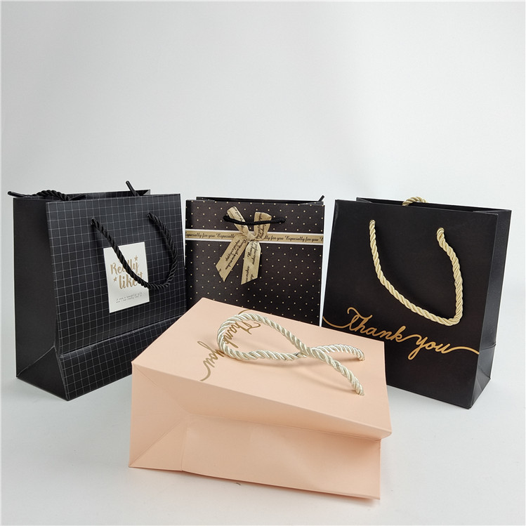 Wysokiej jakości niestandardowe drukowanie cyfrowe Logo drukowane torebka papierowa opakowanie biały 110 gram wielokrotne